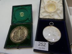 A Victorian Botanic Society medallion, 1839 in fitted case, by Wyon and one other Botanic Medallion,