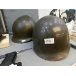 World War II US M1 helmet, complete with Liner, sweat band and chin strap (buckle marked with anchor