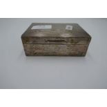 A small silver cigarette box having engine turned design and engraved message on the front. Great si