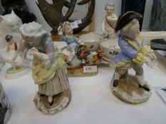 A pair of 19th century German porcelain figures of ladies and gent 11.5cm and two other items