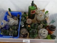 A quantity of old poison bottles and similar