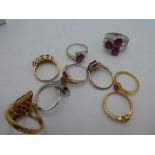 A small collection of silver dress rings all set with rubies all marked 925