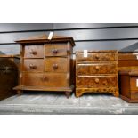 An Oriental lacquer miniature chest and other wooden boxes