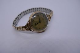 Vintage ladies 9ct gold cased Omega wristwatch with dennison case, 467878 F, movement stamped Omega