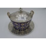 A very eye catching early Victorian silver and glass enamel butter dish with ornate engraved silver