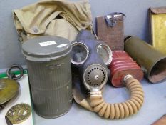 World War II Military issue gas mask (1940) in canvas bag, Civilian gas mask in tin and World War I