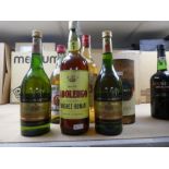 Two bottles of 103 Brandy, two bottles of Royal Martins and two others