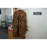 An old fur coat and a silk oriental dressing gown