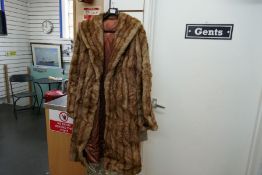 An old fur coat and a silk oriental dressing gown