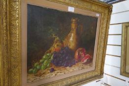 A 19th century oil on canvas 'Still life' with Bellarmine jug and fruit, unsigned, 44.5 x 34cms
