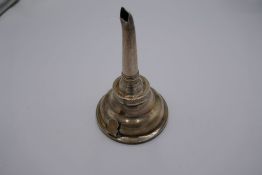 A King George III silver wine funnel with detaching pieces, both hallmarked London 1806 possibly Sol