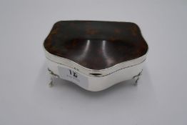 A silver tortoise shell trinket box of high quality and decorative design, on four feet. Hallmarked