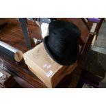 An old black silk Top Hat by Morgan and Ball, a good size