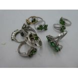 A small quantity of silver dress rings inset with green gemstones, all marked 925