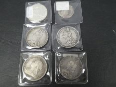 A Charles I shilling 1641-1643, three x Victorian Silver Crowns and two others