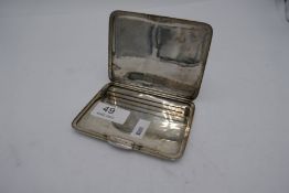 A silver cigarette box, marked 98% Silver, wire spring strap marked Hill Shenstone. Having repouss