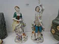 A pair of antique continental porcelain figures of lady and gent with sheep, height 26cm