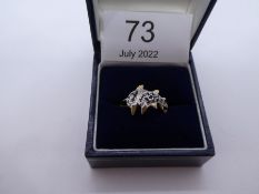 Modern 9ct yellow gold ring with pair of dolphins inset with  blue stones, marked 375, size L, appro
