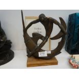 A limited edition bronze sculpture of boy on a Swordfish with certificate, 220/600, 24.5cm