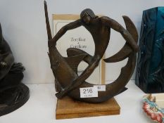 A limited edition bronze sculpture of boy on a Swordfish with certificate, 220/600, 24.5cm