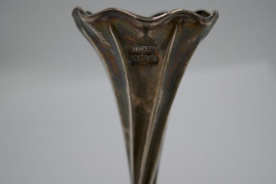 A pair of Edwardian silver tapering fluted vases, having circular foot and scalloped design rim. Hal - Image 4 of 5