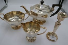 An octagonal silver tea service comprising of a large teapot having a raised octagonal base, having
