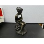 An old brass sculpture of seated nude holding bow, probably French, 27cm