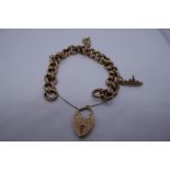 9ct yellow gold curblink bracelet, hung with 2 plated charms, marked 375, with heart shaped clasp 18