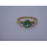 14ct yellow gold three stone ring, central green stone flanked clear gemstones, marked 585, size O,