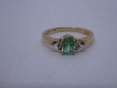 14ct yellow gold three stone ring, central green stone flanked clear gemstones, marked 585, size O,