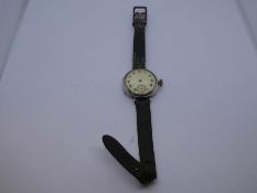 Antique silver cased wristwatch, AF, with enamel dial, marked 935, on brown leather strap