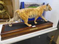A Franklin Mint Tiger model (On The Prowl) with stand, tiger length 54cm
