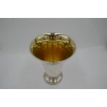 A silver Swedish vase with gilt interior on a raised pedestal gadrooned base. Exceptional quality, d