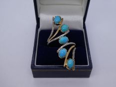 Fancy design 9ct dress ring set with turquoise and clear stones, size T, marked 375, 7.4g