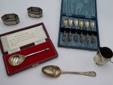 A silver cased reproduction spoon, hallmarked London 1975 C J Vander Ltd., a cased set of 800 decora