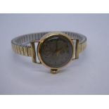 Vintage ladies 9ct yellow gold cased Smiths wristwatch on adjustable strap, case marked 375, CPS