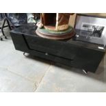 A modern black gloss TV stand