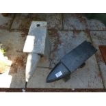 An iron 56lb Anvil and a model Anvil made from concrete