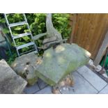 Four items of root formed garden furniture