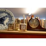 A selection of mantle clocks including slate and wooden cased examples
