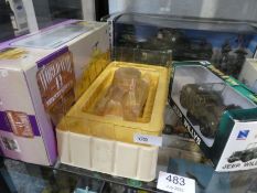 Corgi and other boxed military vehicles to include battery operated tank (4)