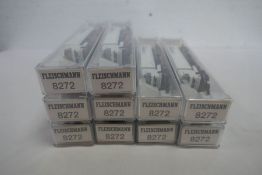 'N' gauge; ten Fleischmann rolling stock wagons with lorries, boxed (appear mint and unused conditio