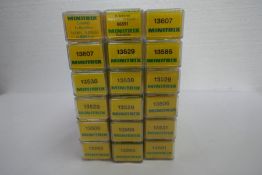 'N' gauge; sixteen various Minitrix rolling stock wagons, boxed, and two boxed Behalter assortments,