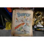 A box of vintage Bunty magazines from the 1970s