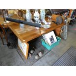 A 1970s teak extending dining table, having central tiled top, the base stamped AM (Ansager-Mobler),