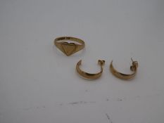 9ct yellow gold ring with heart shaped panel and a pair of yellow metal earrings, 2.2g