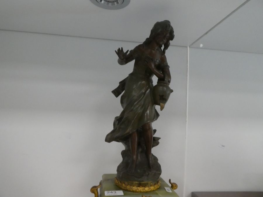 An antique French figural clock having spelter lady holding bucket with gilt metal and onyx base, 62 - Image 3 of 6