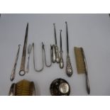 A quantity of items to incl. silver backed brush by M Bros with hammered design, also with a pair of