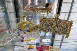 A mixed lot of metalware to incl. an ornate brass letter rack