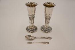 A pair of Victorian silver Elkington and Co Ltd vases having scalloped design rim, raised circular b